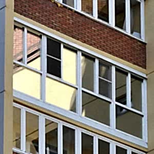 Металлопластиковые окна для лоджии Рехау Бриллиант панорамные с тонировкой